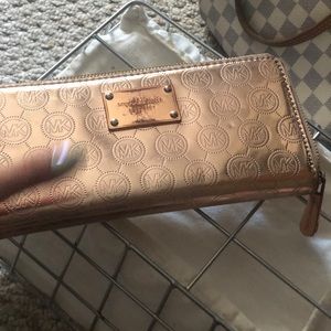 Michael Kors gold wallet sold sold sold